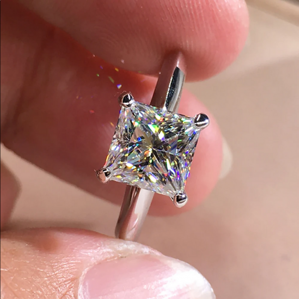 Square rings made of 925 sterling gold with moissanite